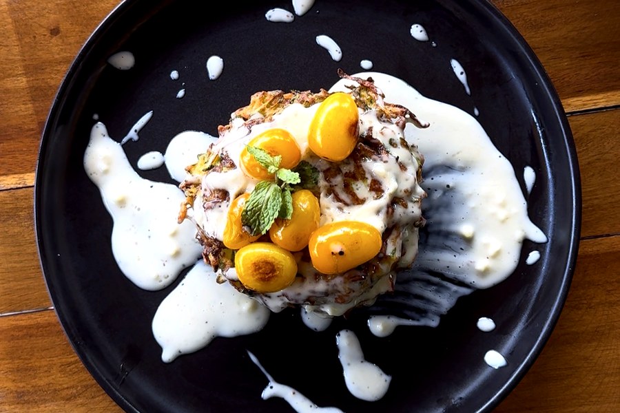 Zucchini fritters with yogurt sauce and cherry tomatoes at Oasis Food Lamai