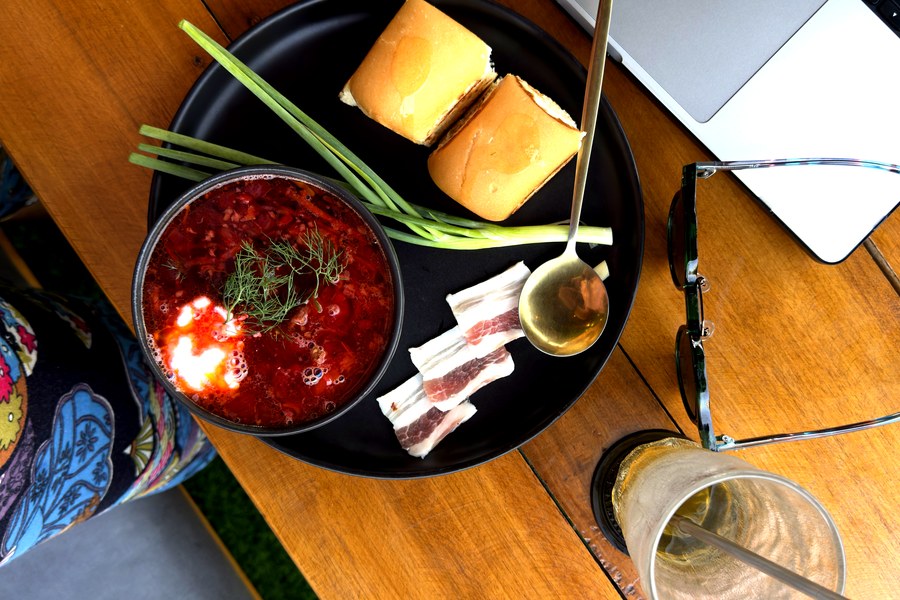 Ukrainian borshch with garlic buns, green onion and lard at Oasis Food Lamai